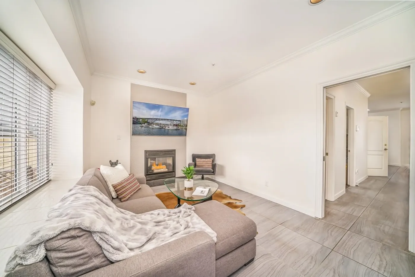 Family room with fireplace at 3108 East 6th Ave