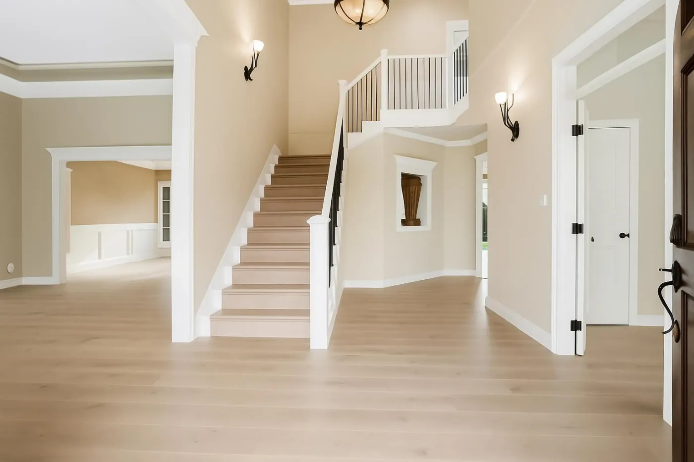 Two-storey foyer and staircase at 3660 Raymond Ave