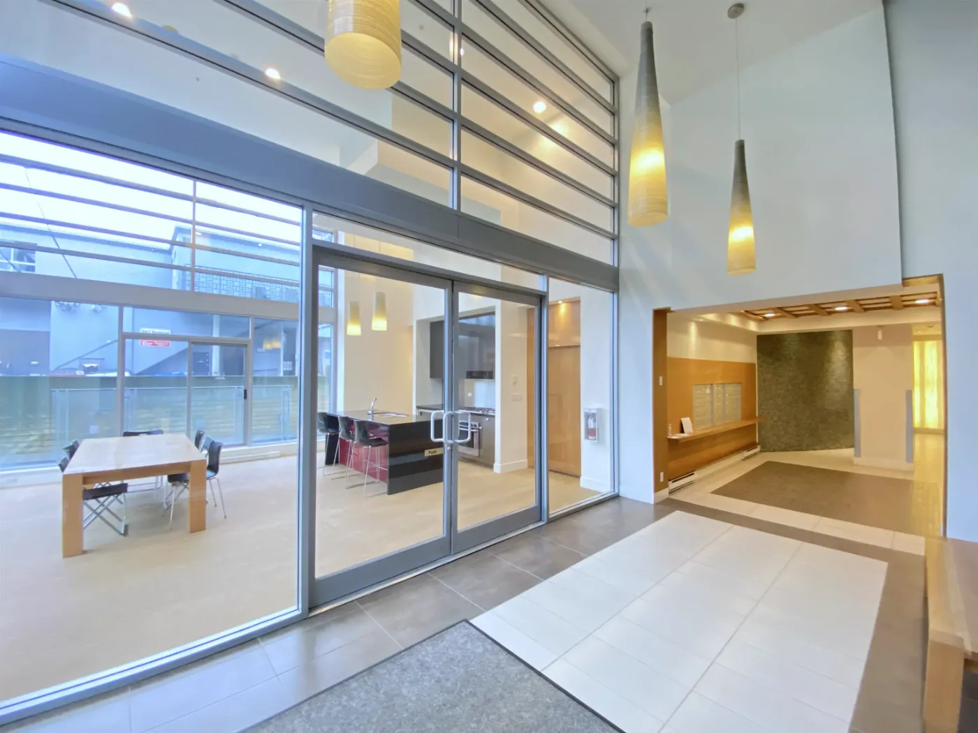 Double-height lobby at 1530 West 8th Ave