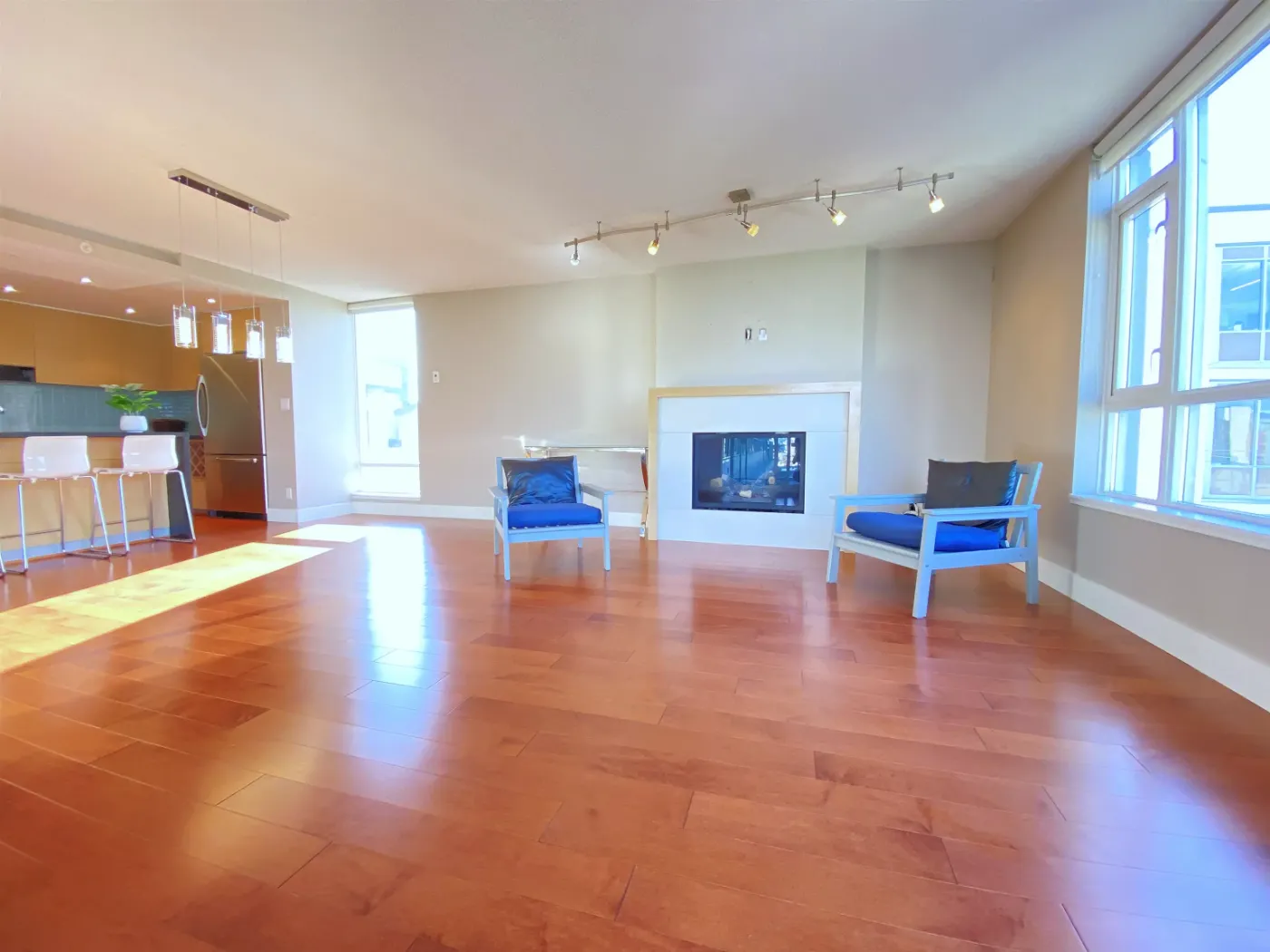 Living room with fireplace at 604 – 1530 West 8th Ave